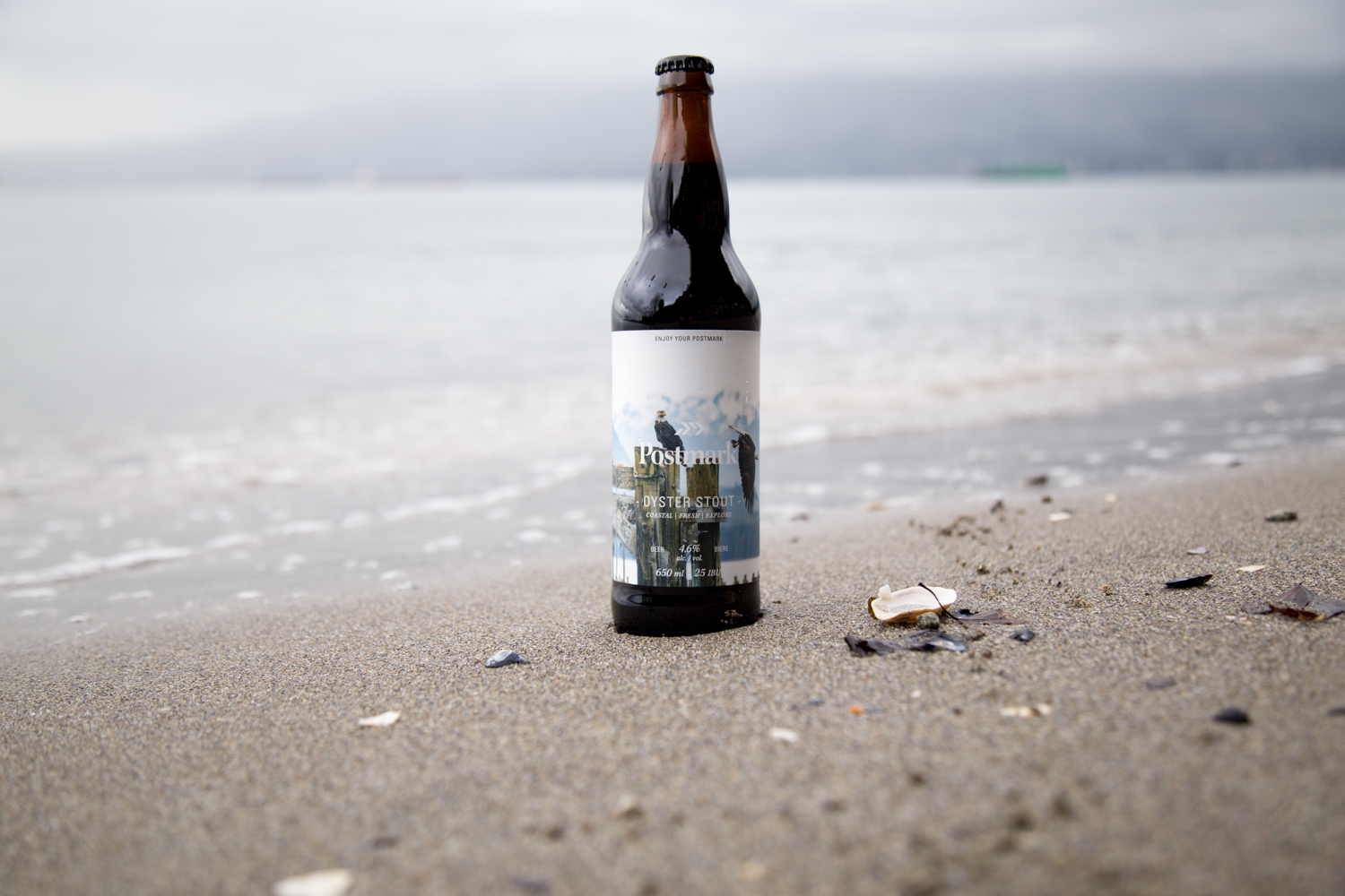 postmark-brewing-bomber-oyster-stout-beach.jpg